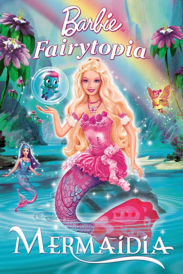 The poster for the movie 'Barbie Fairytopia: Mermaidia' In the front is Barbie as Elina sititng on a rock in the sea. She is wearing a hot-pink bodice with three roses around the top and other floral details across it. The bodice has white detached sleeves with roses around the trim to match.Elina's skirt is the same shade of pink with a velvet texture. She has a light-purple mermaid tail with hot-pink swirls and powder-blue flowers across it. Its fin resembles a buch of flower petals. One of Elina's palms is facing up, towards Bibble who is in a transparent bubble. Behind her to the left is the mermaid Nori. Her hair is a gradient of sea-blue and purple and she's wearing a sea-blue bodice with dark-blue swirls and pink flowers on it. Her skirt also seems to be sea-blue. Her tail is hot-pink with sea-blue swirls and lowers. She is bobbing in the water, her tail under the surface, her torso above. To the right of Elina is a small fairy with hot-pink butterfly wings with bright-yellow swirls. She's wearing a pastel-yellow dress wit a hot-pink belt. Her hair is also hot-pink and tied in pigtails. She's positioned at the end of a rainbow behind Elina. They are all in a lagoon filled with palm-like trees with lilac blooms on their tops.
