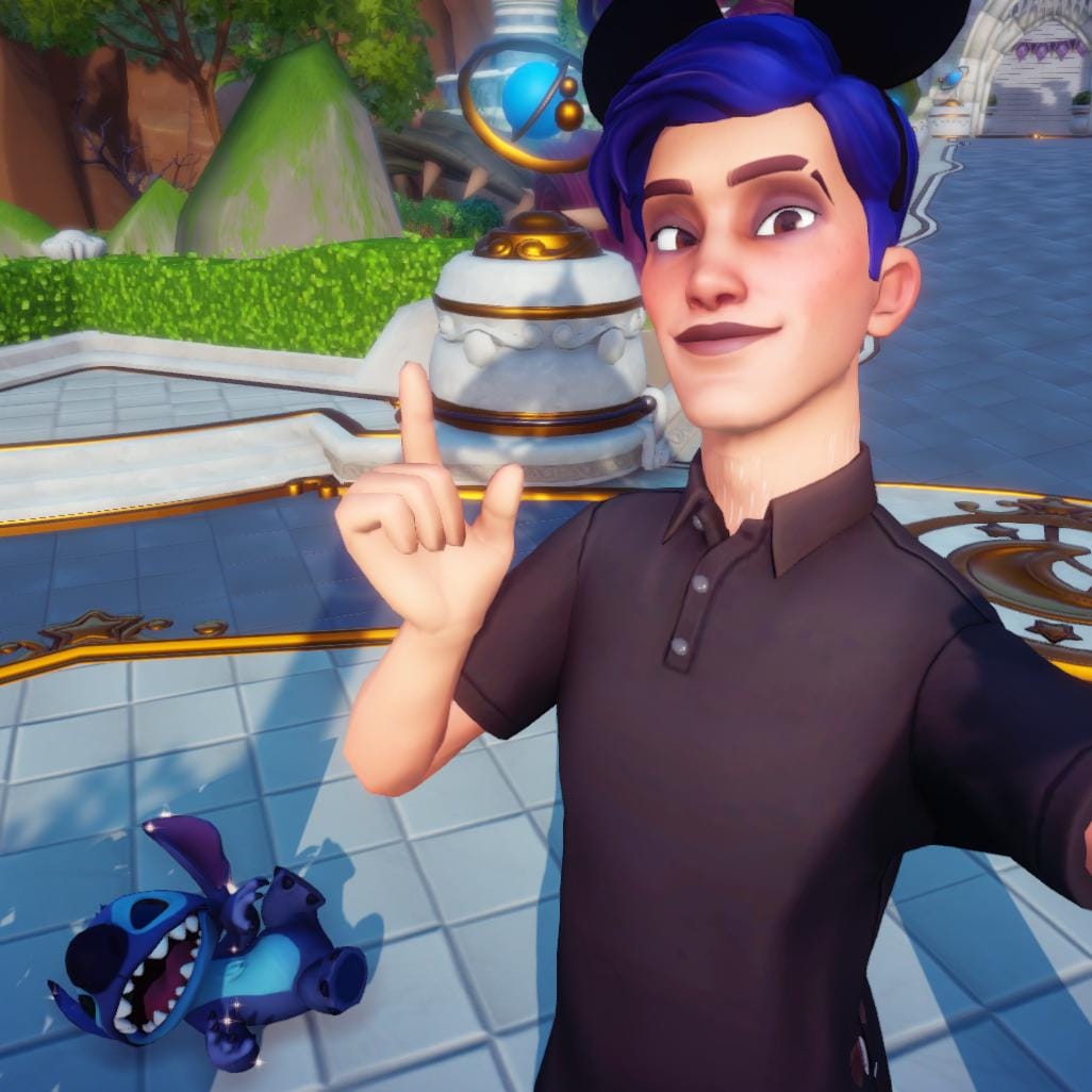 A selfie of Stitch and the player character. Stitch is rolling on the floor, looking like he is laughing, and the player is smiling happily.